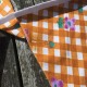 Håndlavet stofvimpel med lilla toner og fine blomster