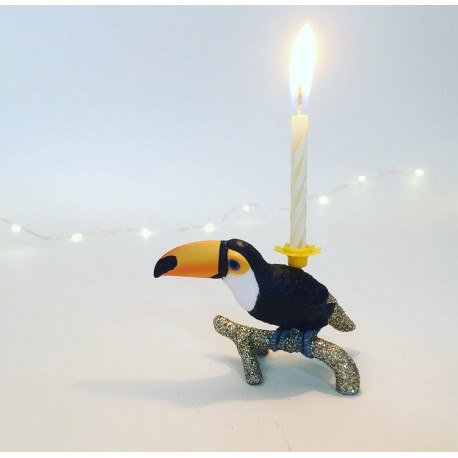 Tukan caketopper og lysholder til fødselsdagskage